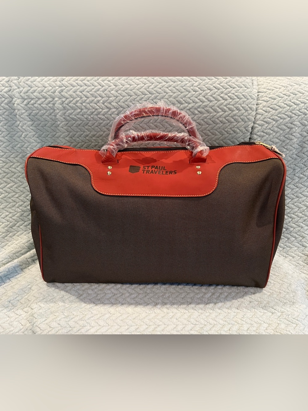 The Travelers St. Paul NWT Weekend Travel Bag, Orange/Brown, 22” long